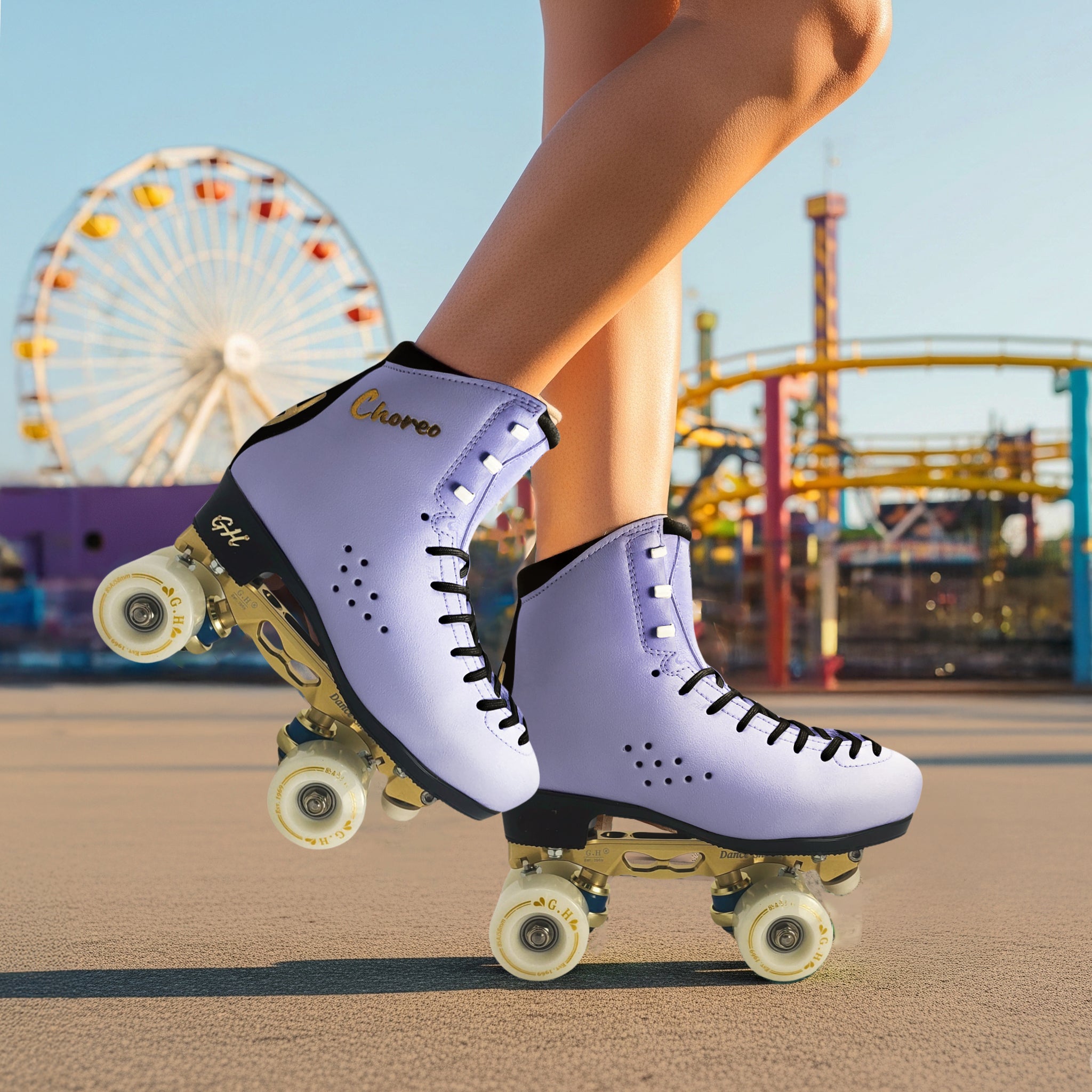 Purple roller skates with yellow wheels worn by a person at an amusement park.